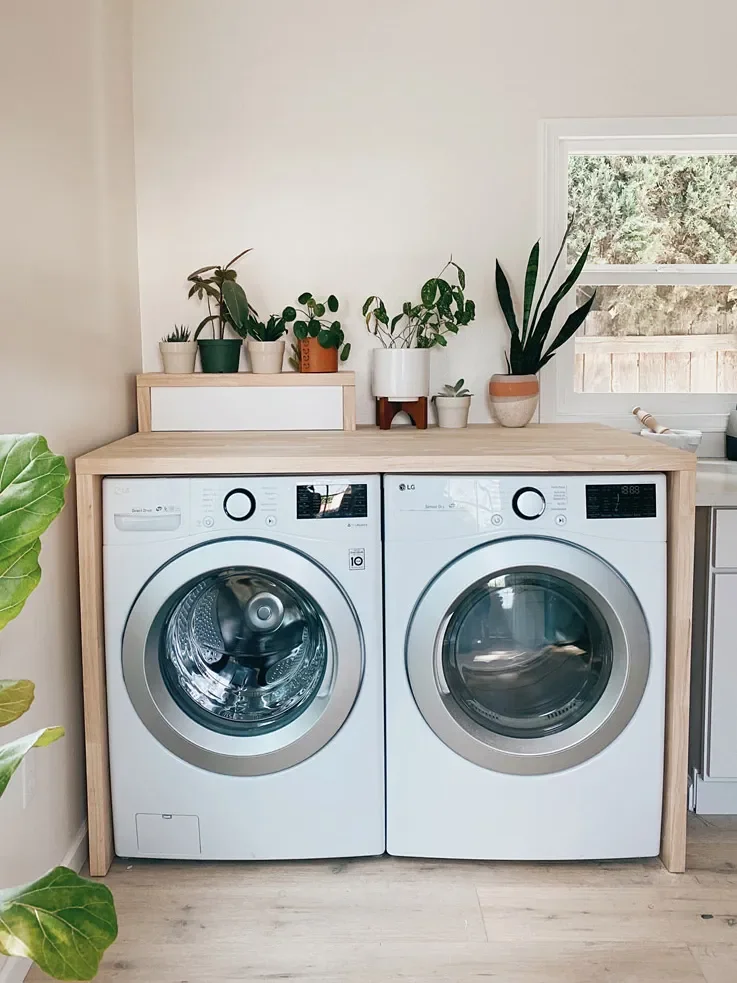 6 Clever Ways to Hide a Washer and Dryer in Your Kitchen (Yes, Really)
